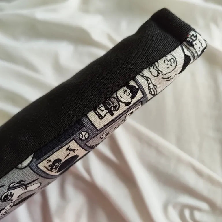 accesorio de lectura inspirado en dibujos animados de peanuts