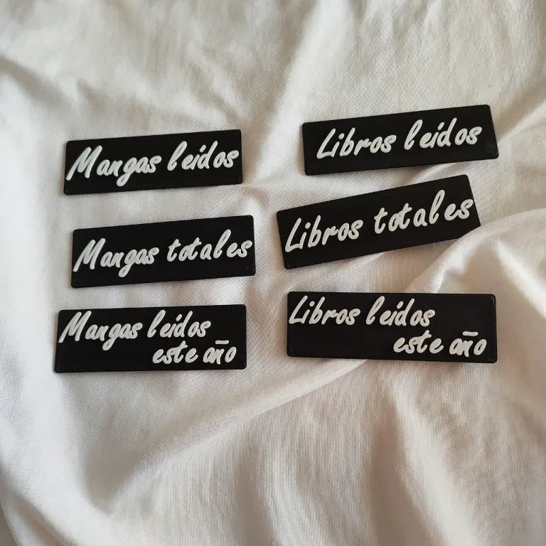 carteles de contador de lecturas y libros en color negro