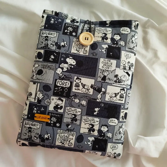 funda para libro y kindle con diseño de tiras cómicas de peanuts