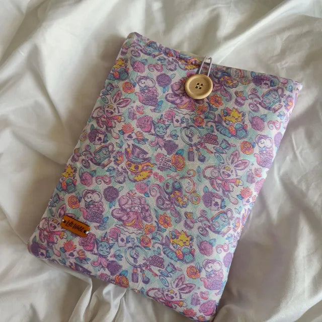 Funda para libro y Kindle en tonos rosados, lilas y azules